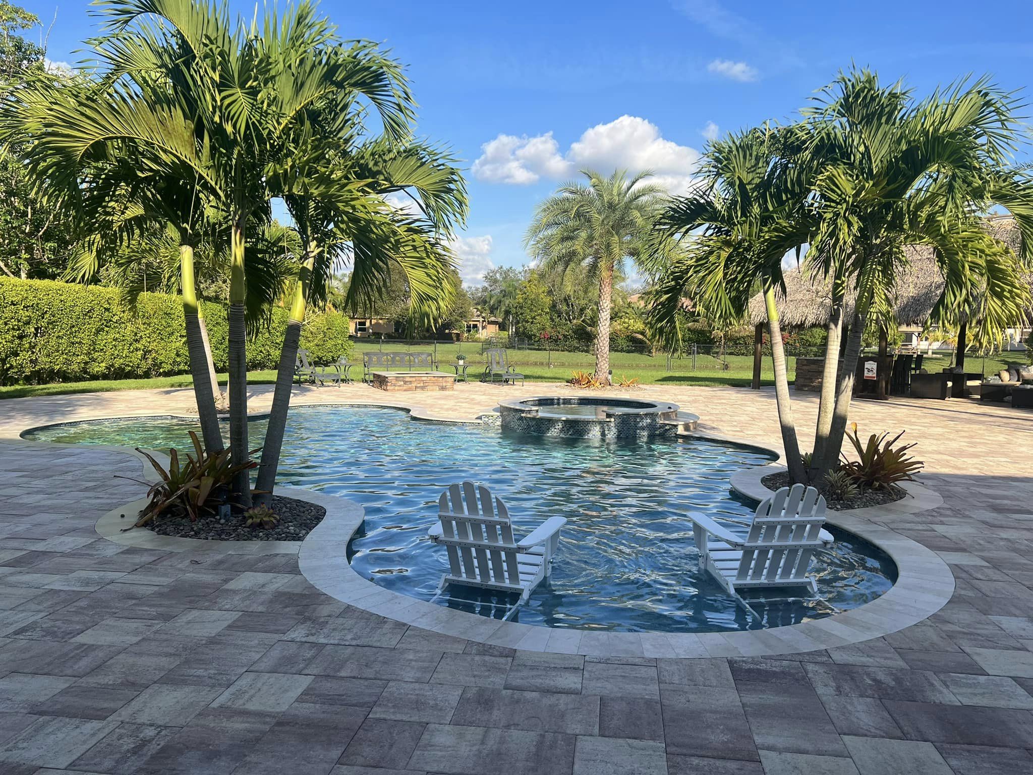 Finished pool deck paver renovation in South Florida by Premier Pavers Pools and Construction