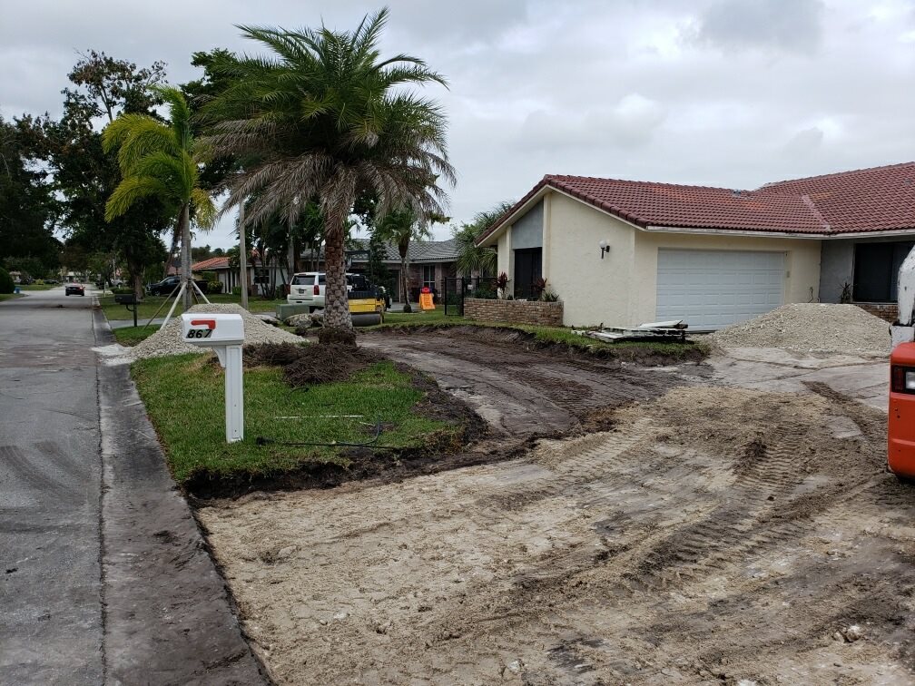 Before photo of old concrete driveway before paver installation in South Florida